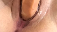 Stunning close up pussy toying action from busty solo beauty