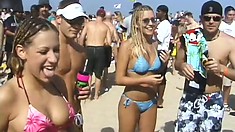 Tanked sluts flash their tits for a chance to get some beads